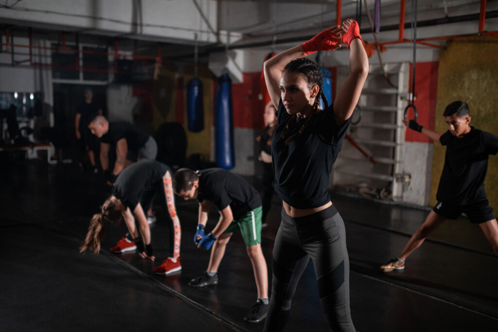 Young athletes training for a kick boxing class